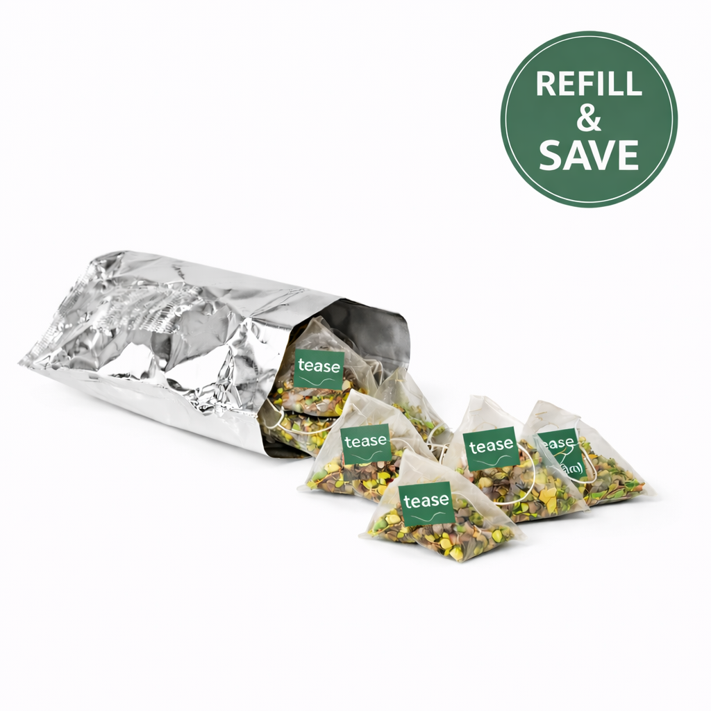 Tease Wellness Peach, Please Refill skin support tea blend in silver foil pouch with pyramid tea bags displayed.